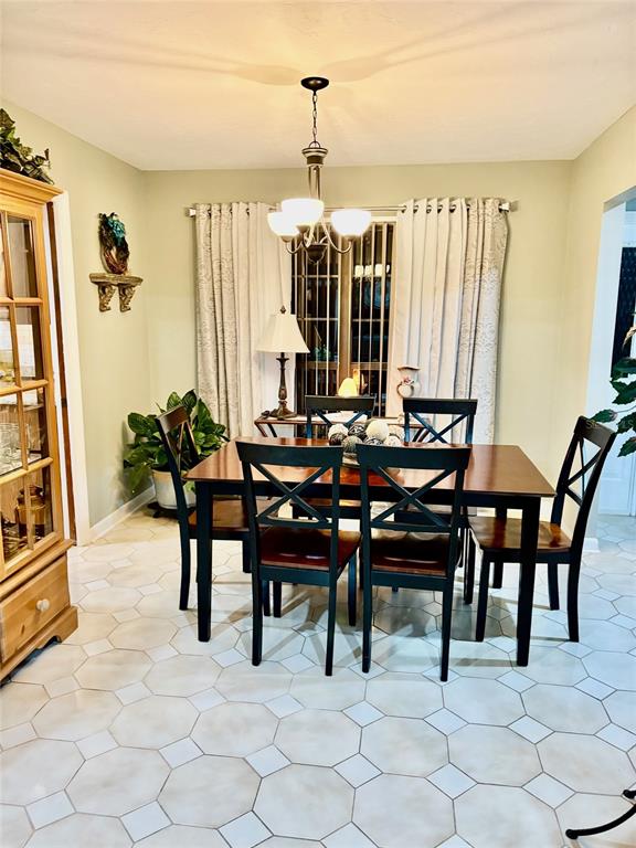 19807 Southwest 85th Loop Dunnellon, FL 34432 - Photo 16 of 60 a view of a dining room with furniture