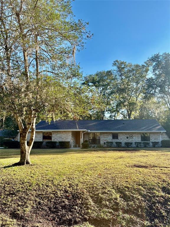 19807 Southwest 85th Loop Dunnellon, FL 34432 - Photo 2 of 60 a view of a large pool with an outdoor space