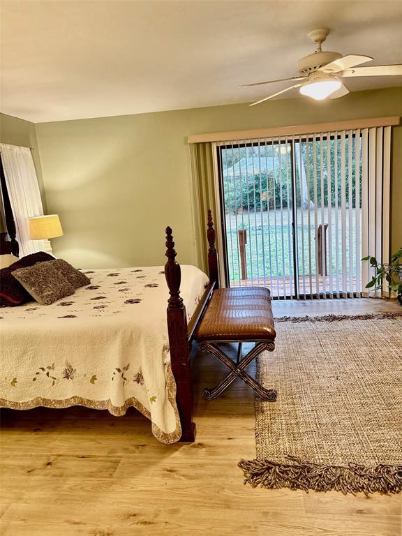 19807 Southwest 85th Loop Dunnellon, FL 34432 - Photo 28 of 60 a bedroom with a bed and a window