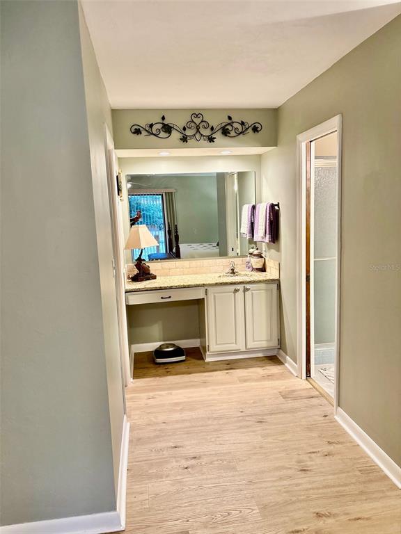 19807 Southwest 85th Loop Dunnellon, FL 34432 - Photo 34 of 60 a room with a bed and a large window