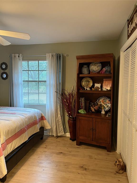 19807 Southwest 85th Loop Dunnellon, FL 34432 - Photo 41 of 60 a bedroom with a bed and a window