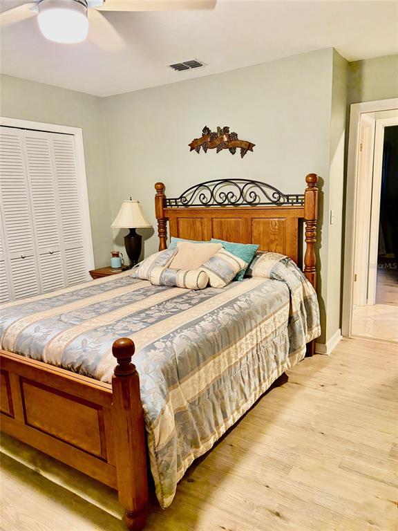 19807 Southwest 85th Loop Dunnellon, FL 34432 - Photo 46 of 60 a bedroom with a bed and a window