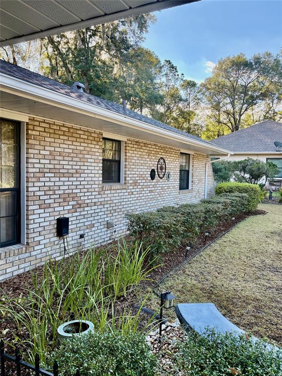 19807 Southwest 85th Loop Dunnellon, FL 34432 - Photo 6 of 60 a backyard of a house with lots of green space