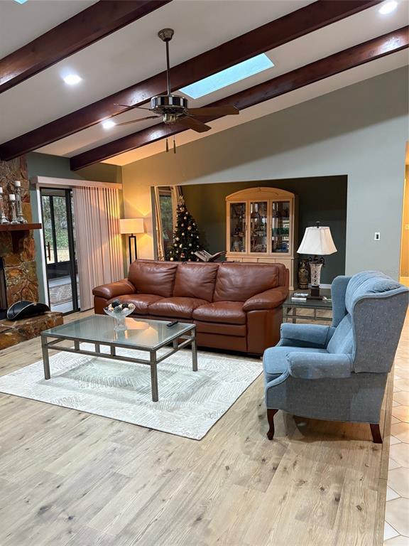 19807 Southwest 85th Loop Dunnellon, FL 34432 - Photo 10 of 60 a living room with furniture and a ceiling fan