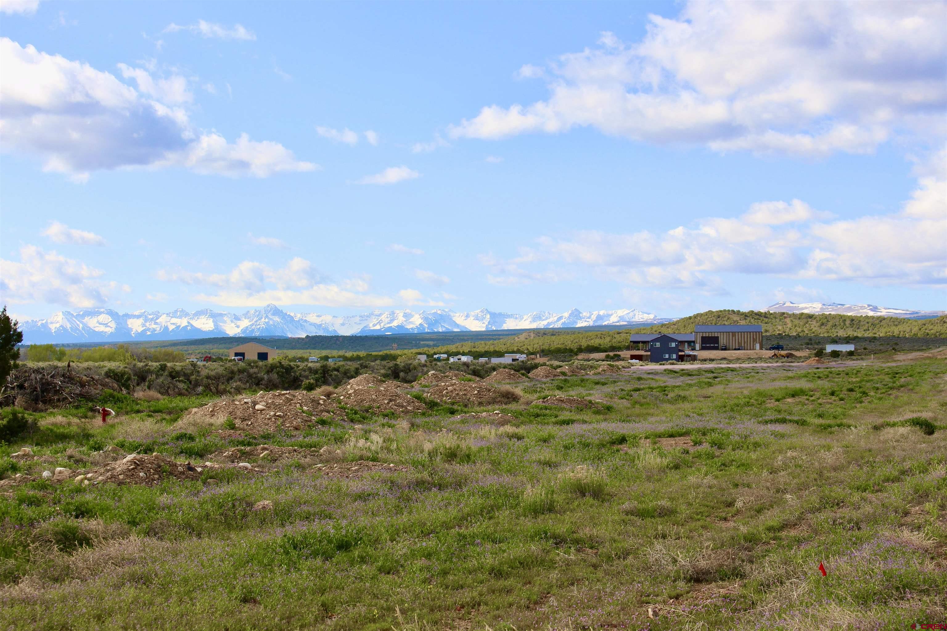 Lot 3 6300th Road Montrose, CO 81403 - Photo 21 of 25 a view of a city with an ocean