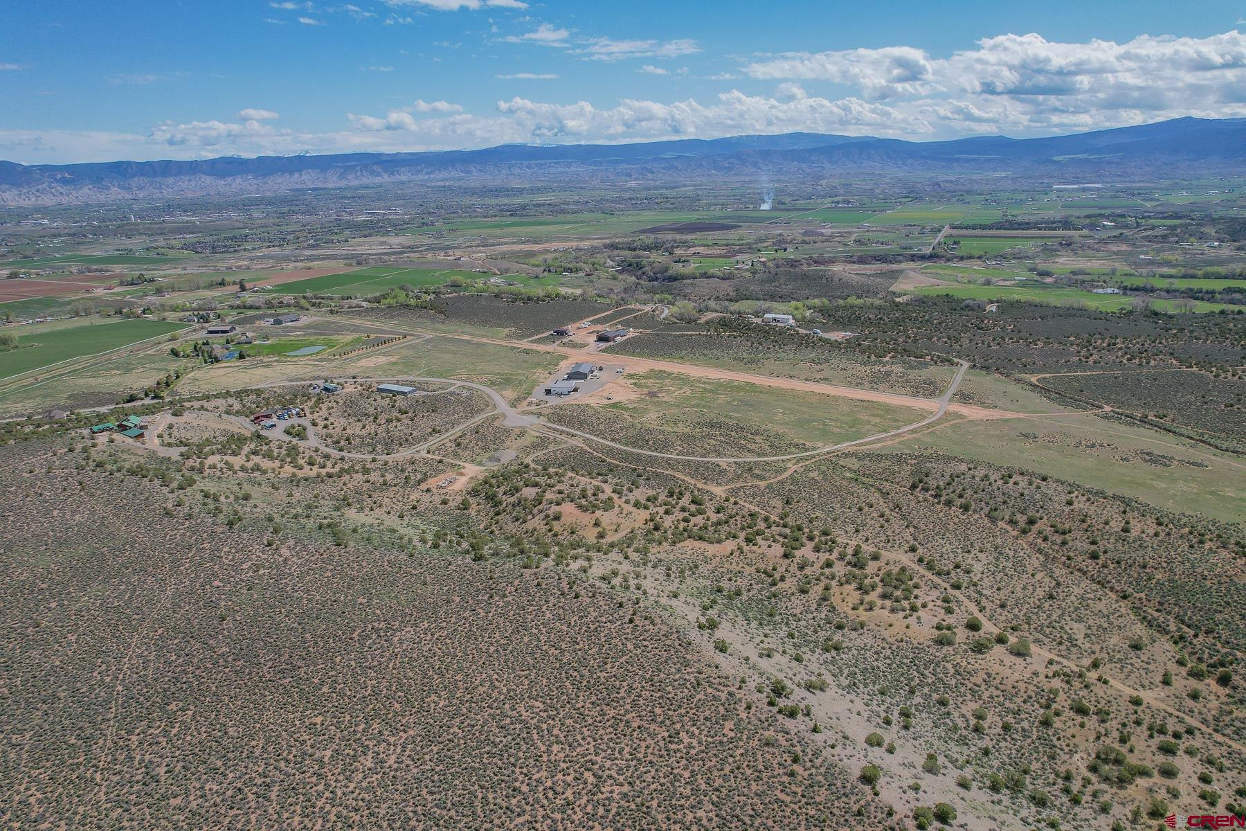 Lot 3 6300th Road Montrose, CO 81403 - Photo 4 of 25 a view of a field with an ocean