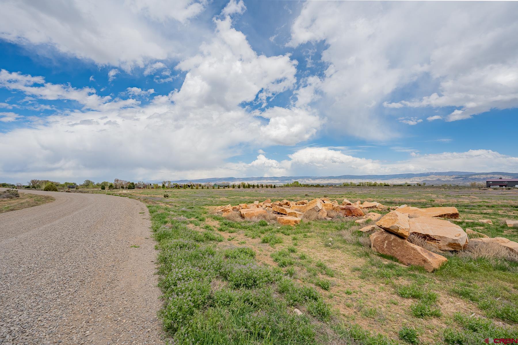 Lot 3 6300th Road Montrose, CO 81403 - Photo 10 of 25 a view of a lake and mountain in the back