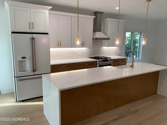 a white bath tub sitting in a bathroom