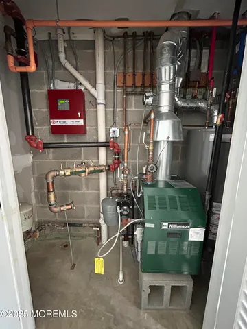 a kitchen with stainless steel appliances a refrigerator and a stove