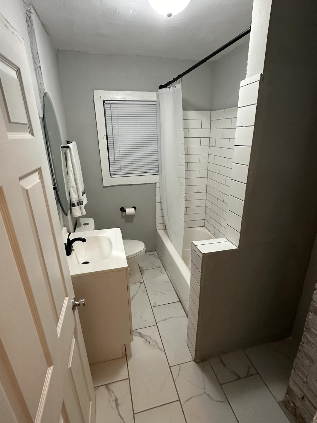 3579 Kendrick Road Memphis, TN 38108 - Photo 7 of 8 Full bathroom featuring shower / tub combo, vanity, and toilet