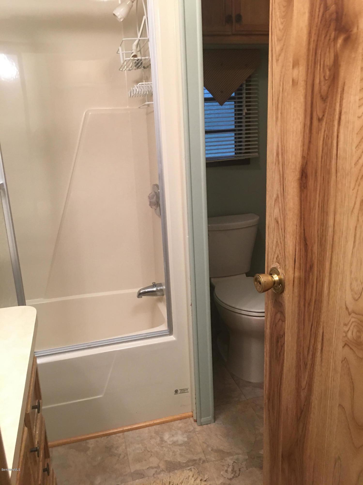 7 North Main Road Otis, MA 01253 - Photo 14 of 24 a bathroom with a bathtub