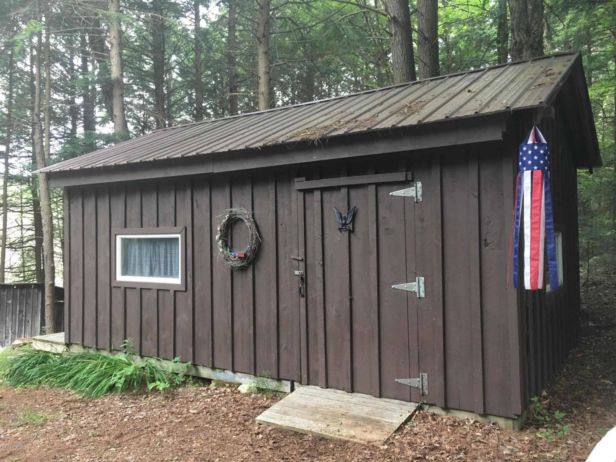 7 North Main Road Otis, MA 01253 - Photo 21 of 24 a backyard of a house