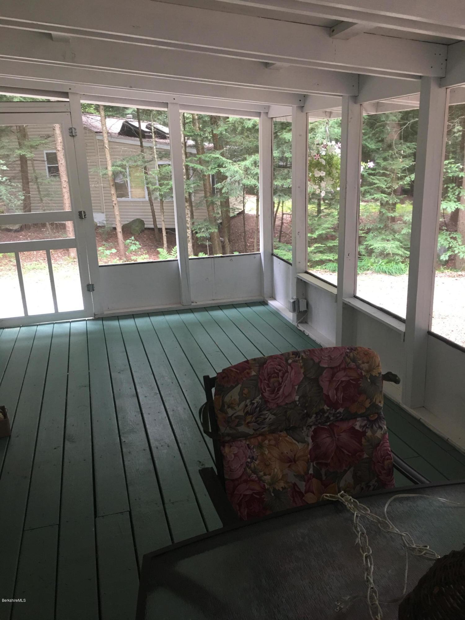7 North Main Road Otis, MA 01253 - Photo 24 of 24 a living room with a large window