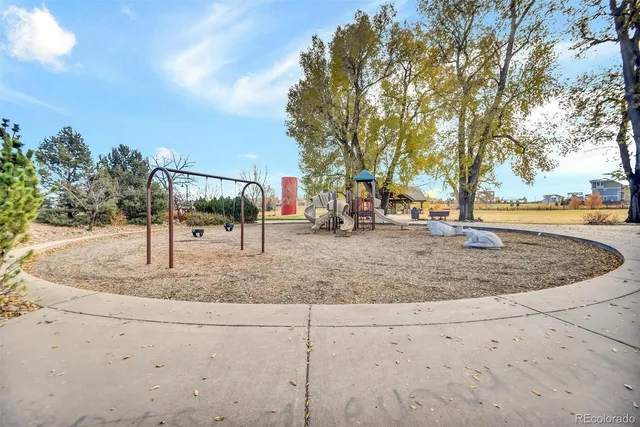 a view of a park with swings