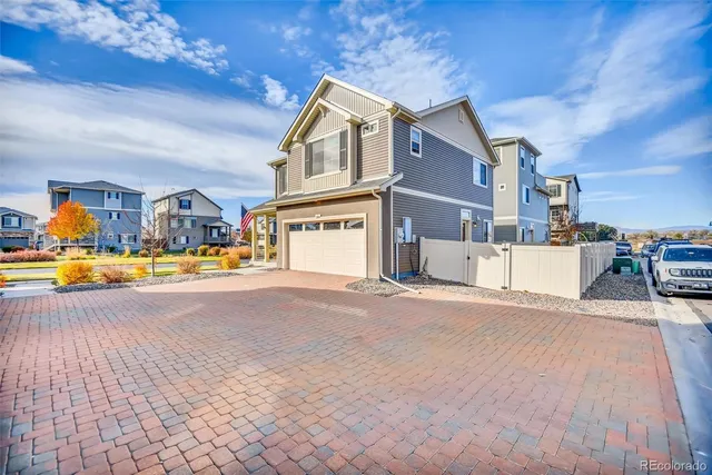 a view of a street with houses