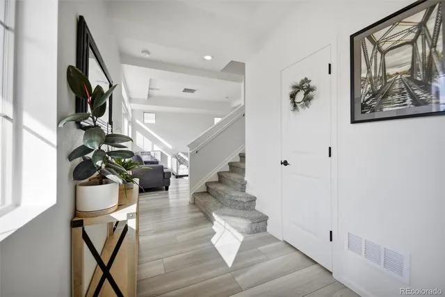 a view of entryway with wooden floor