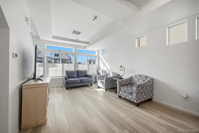 a living room with furniture and a couch