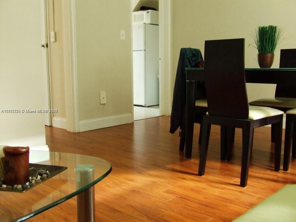 635 83rd Street, Unit 47 Miami Beach, FL 33141 - Photo 9 of 16 a view of a workspace with furniture