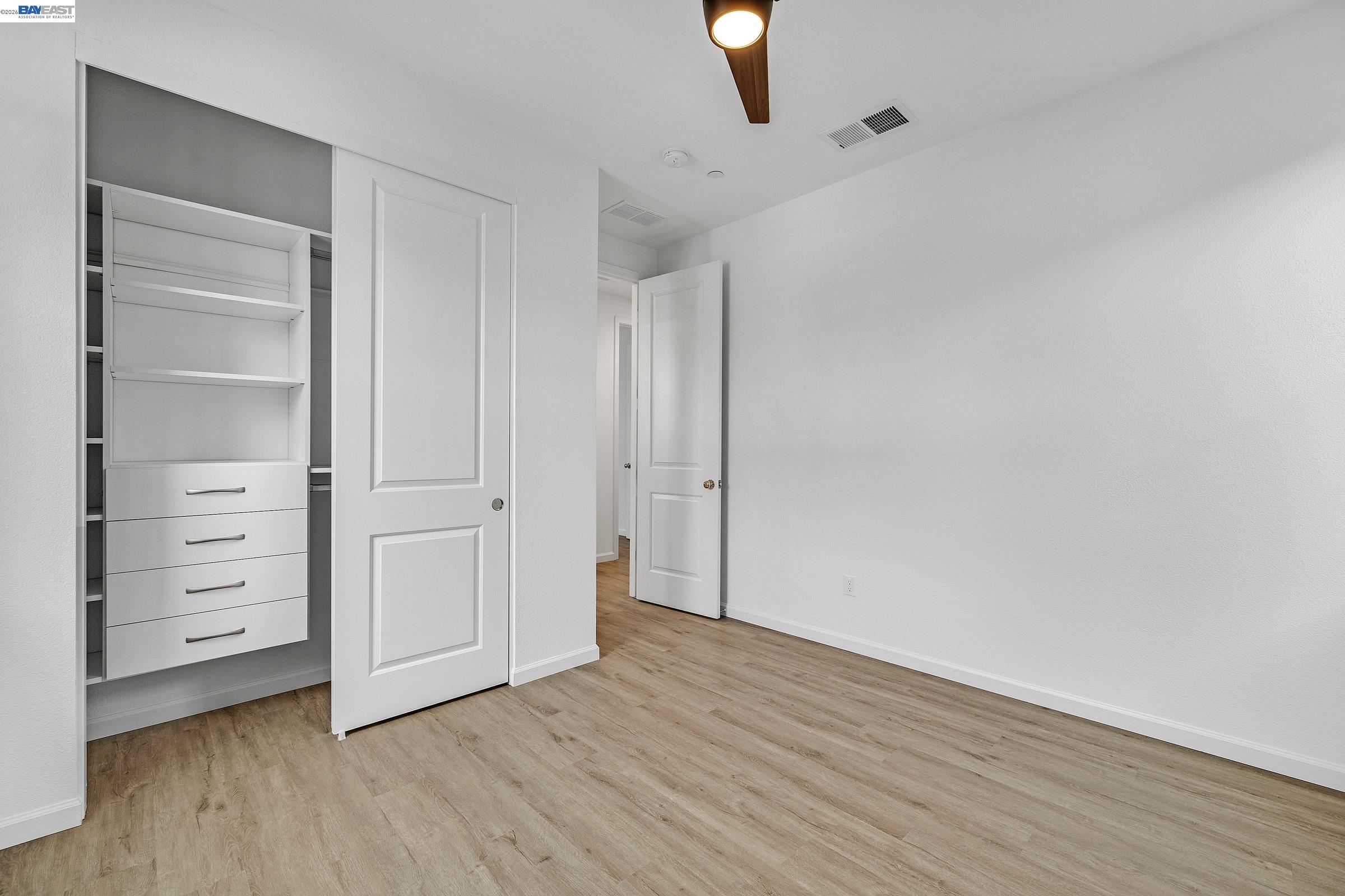 5990 Peridot Place Dublin, CA 94568 - Photo 23 of 43 Bedroom 4 with custom closet.