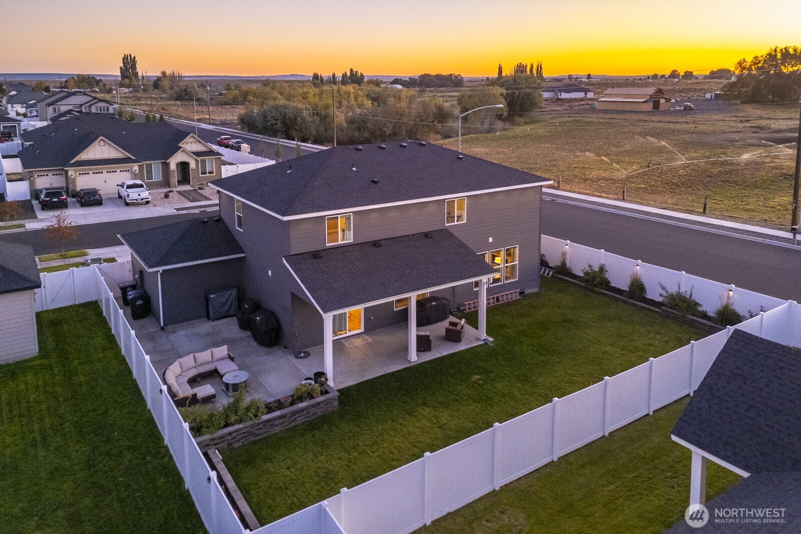 4750 Hawk Street Moses Lake, WA 98837 - Photo 4 of 35 an aerial view of a house with a garden