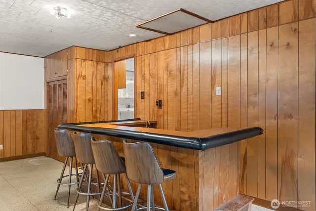a close view of a chair and table in the kitchen