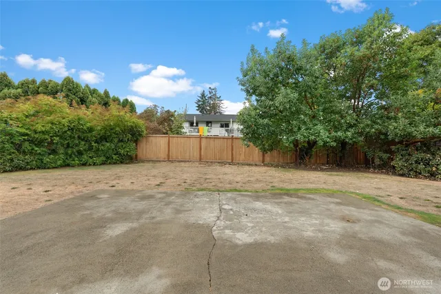 a view of a backyard of a house