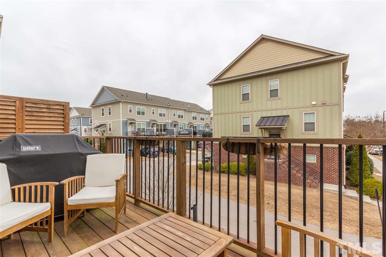 1325 Rodessa Run Raleigh, NC 27607 - Photo 13 of 25 a view of a two chairs on the roof deck