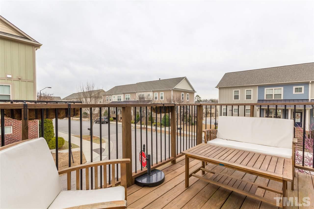 1325 Rodessa Run Raleigh, NC 27607 - Photo 14 of 25 a view of a house with wooden deck