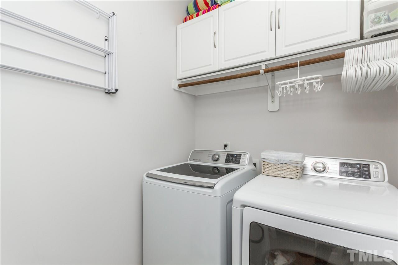 1325 Rodessa Run Raleigh, NC 27607 - Photo 20 of 25 a utility room with dryer and washer