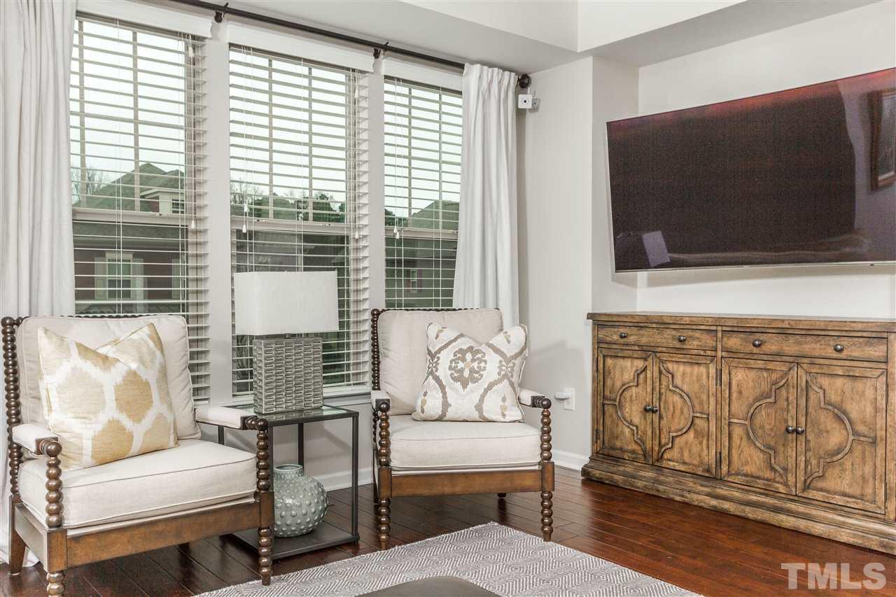 1325 Rodessa Run Raleigh, NC 27607 - Photo 4 of 25 a living room with furniture and a flat screen tv