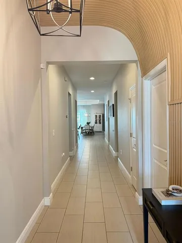a view of a hallway with a furniture