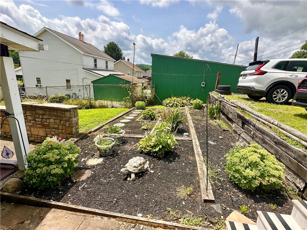 461 Walnut Hill Road Uniontown, PA 15401 - Photo 8 of 26 a view of a backyard with sitting area