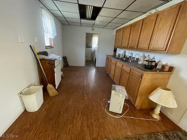 41275 Roy Watson Road Woodsfield, OH 43793 - Photo 4 of 26 Kitchen featuring dark hardwood / wood-style floors, a drop ceiling, and sink