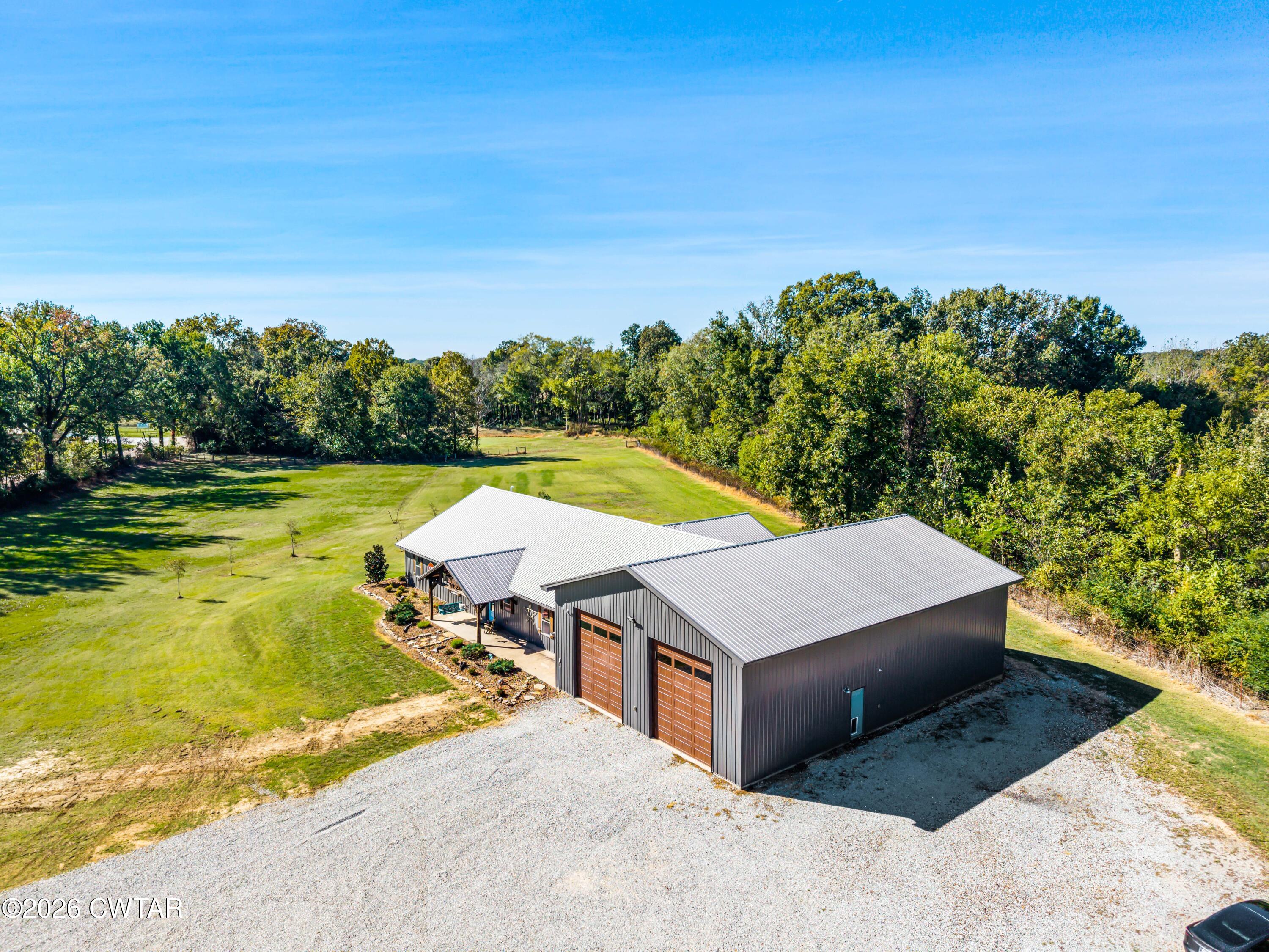 a view of swimming pool with a yard