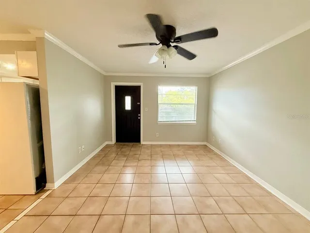 a view of an empty room and window