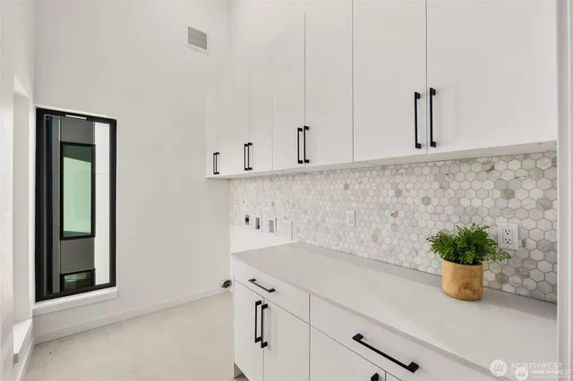 a view of cabinets with potted plant