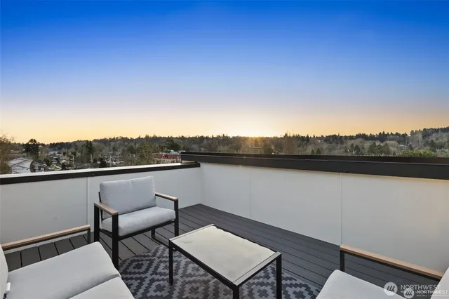 a view of a lake with couches