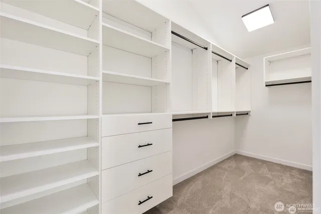 a view of an empty walk in closet