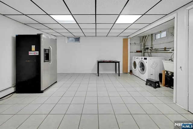 a view of a hallway with seating area