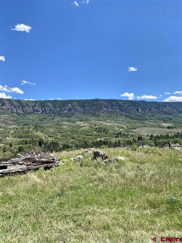Lot 29 Eagles Rest Montrose, CO 81403 - Photo 2 of 9 a view of a field with an ocean beach