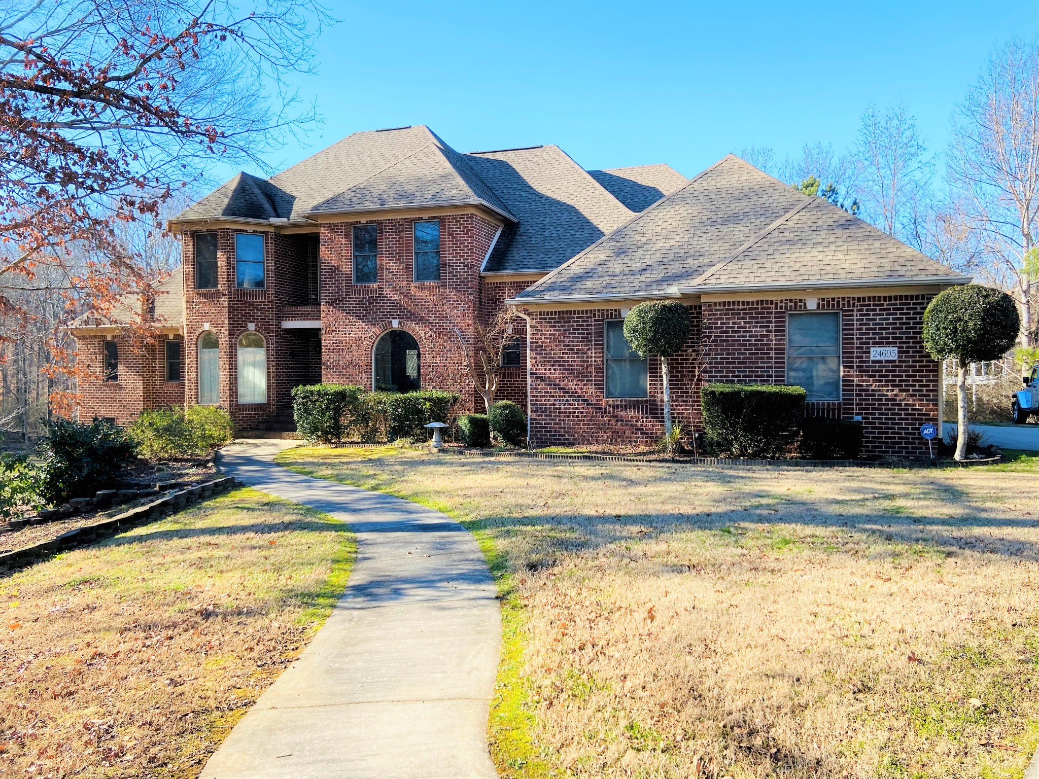 24695 Deer Ridge Lane Athens, AL 35613 - Photo 2 of 49 a front view of a house with swimming pool