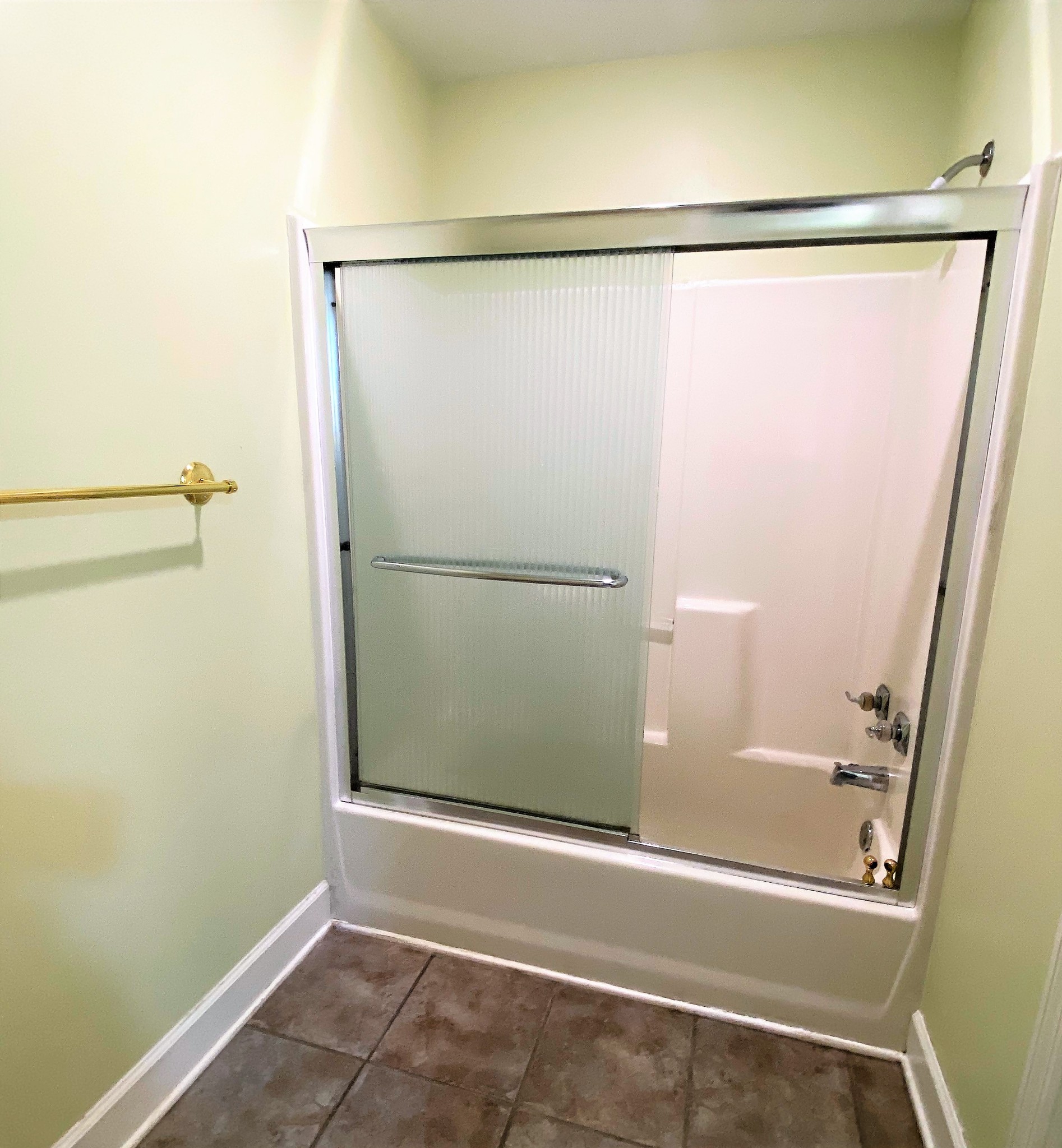 24695 Deer Ridge Lane Athens, AL 35613 - Photo 39 of 49 a bathroom with a glass shower door