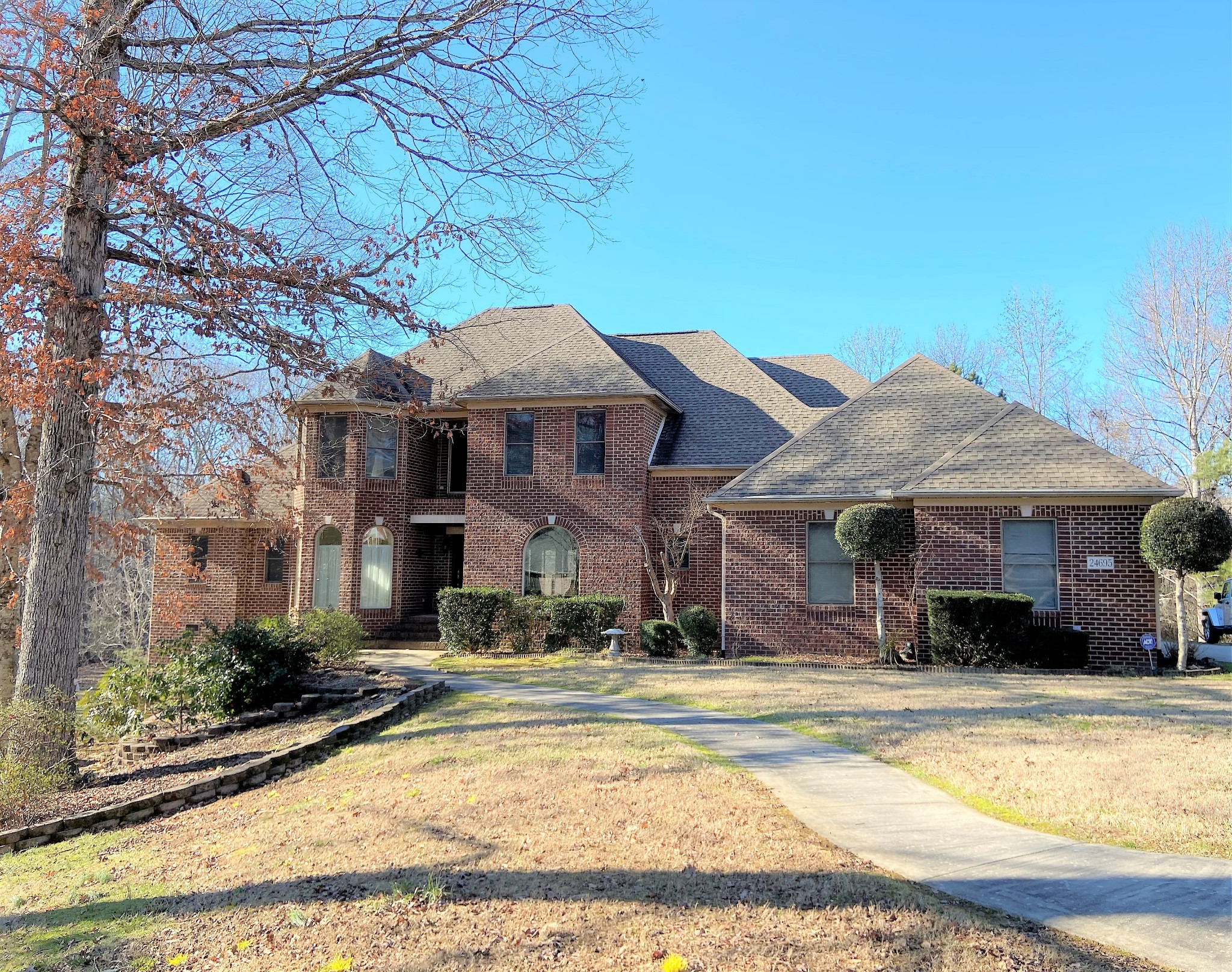 24695 Deer Ridge Lane Athens, AL 35613 - Photo 5 of 49 a front view of a house with swimming pool