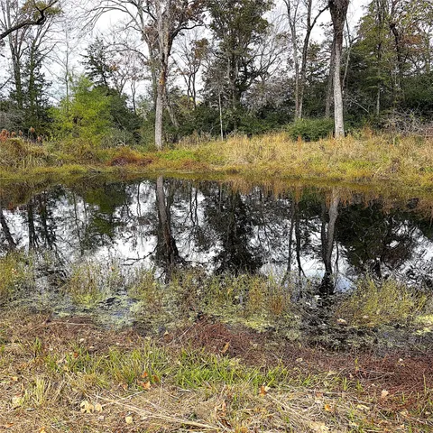 a backyard of a house with seating space
