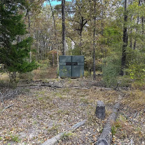 a view of an outdoor space and a yard