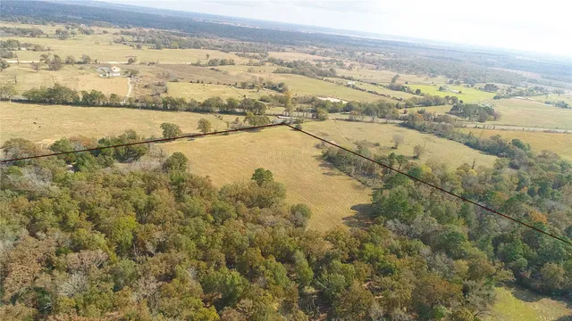 a view of a car in front of a house
