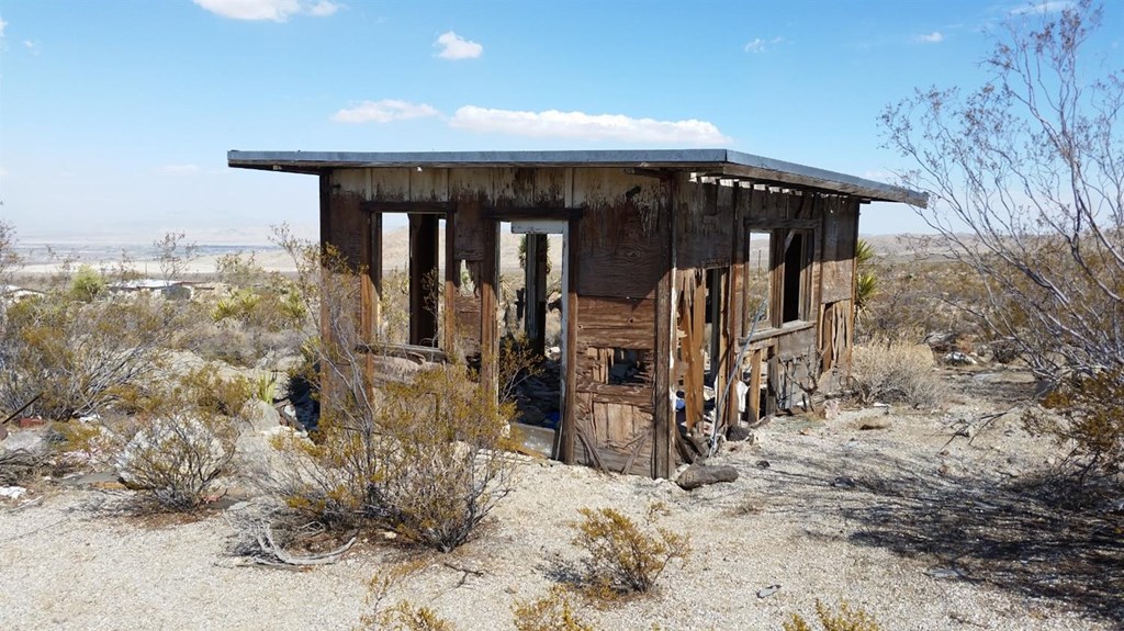 0 Powerline Road Lucerne Valley, CA 92356 - Photo 1 of 10 a view of a house with snow on the wall