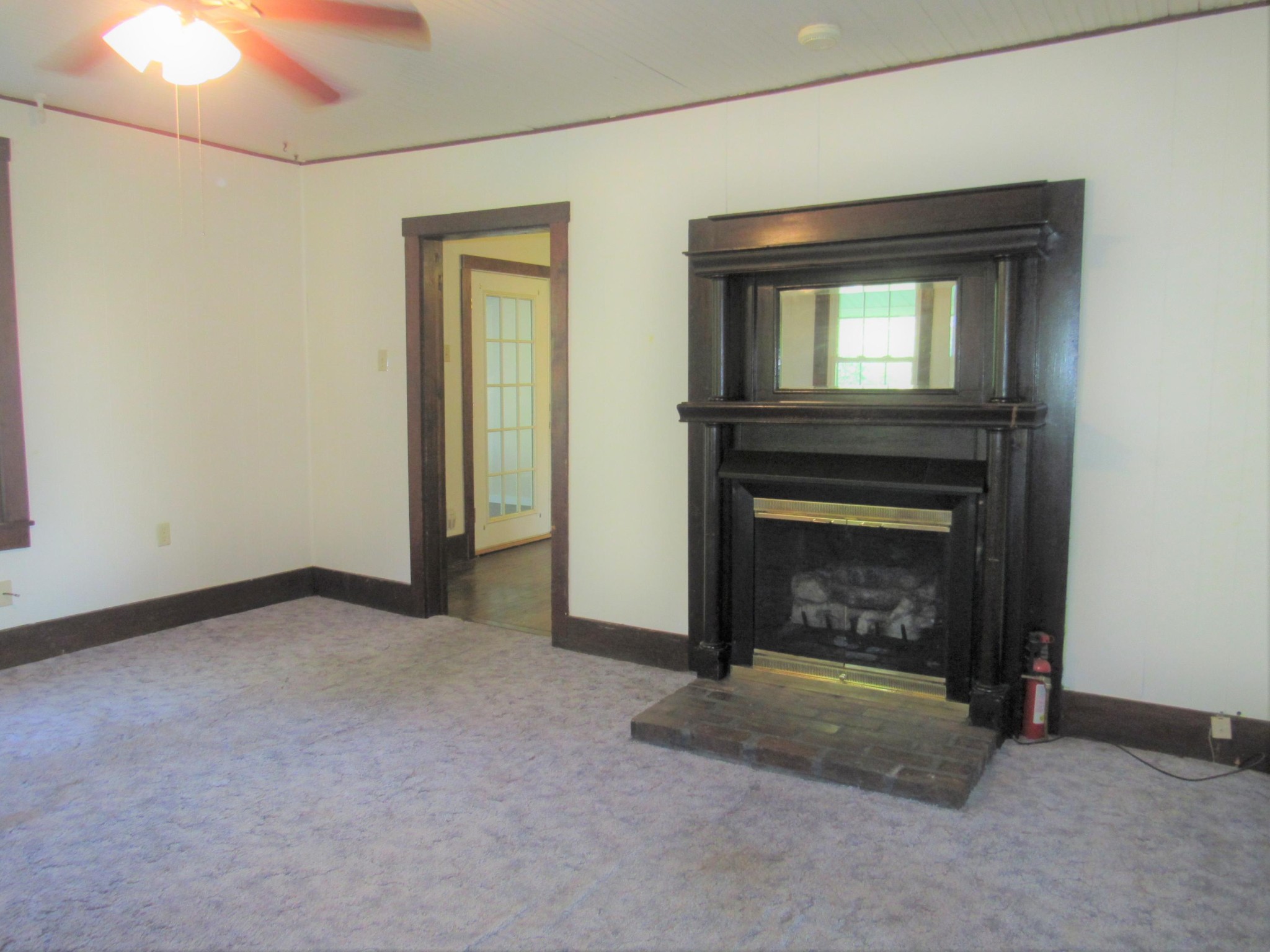 119 Andy Cooper Road Lancing, TN 37770 - Photo 15 of 35 a view of empty room with a fireplace