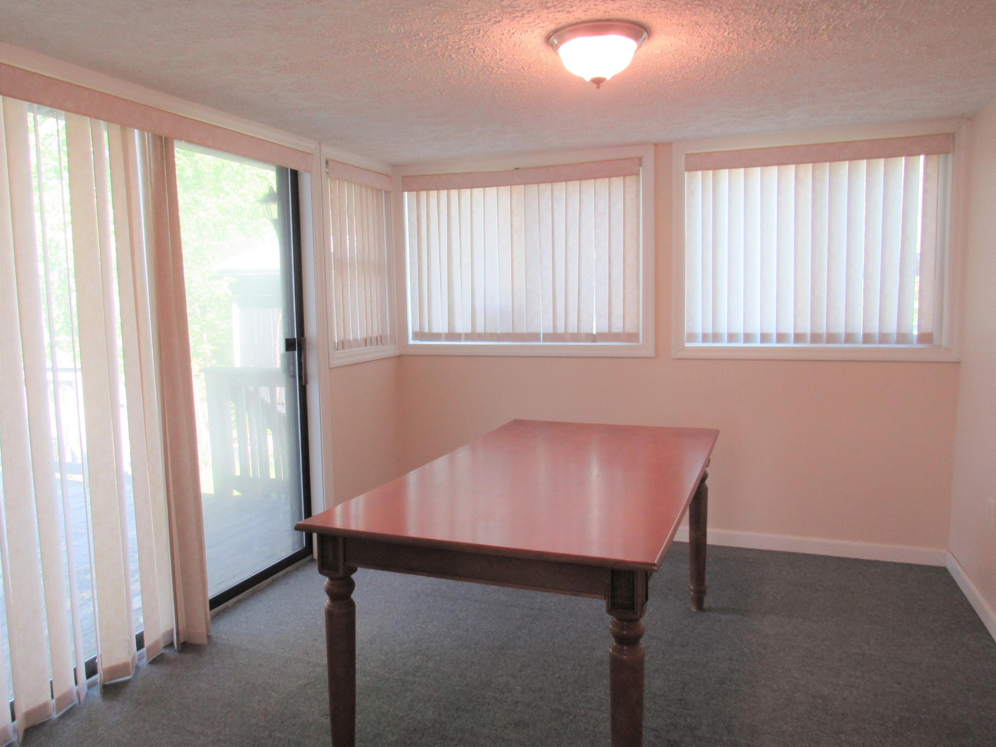 119 Andy Cooper Road Lancing, TN 37770 - Photo 20 of 35 a room that has a bed and a table in it