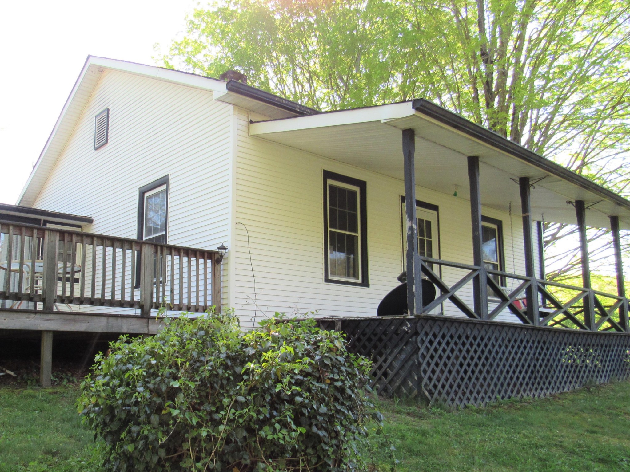 119 Andy Cooper Road Lancing, TN 37770 - Photo 2 of 35 a house view with a garden space